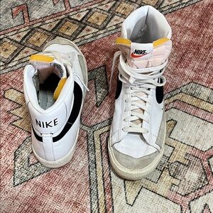 Retro - Nike White High-Top Sneakers with Black Swoosh and Yellow Tongue